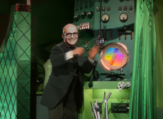 A still from the film The Wizard of Oz with Satya Nadella's head photoshopped onto the wizard and the CoPilot logo photoshopped onto his machine's valves.