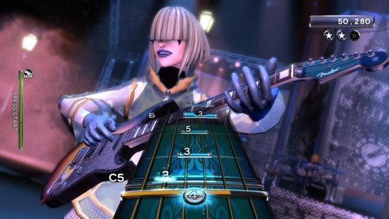 A screencap from the Xbox 360 version of Rock Band showing a guitarist with blond bangs over her eyes.